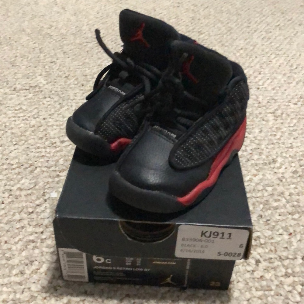 Black, red, and white Jordan’s.